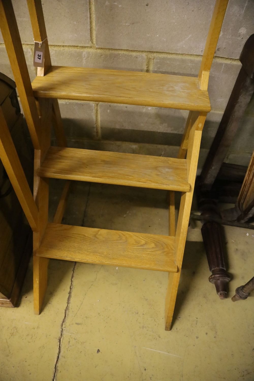 A set of modern oak library steps, width 54cm, height 156cm